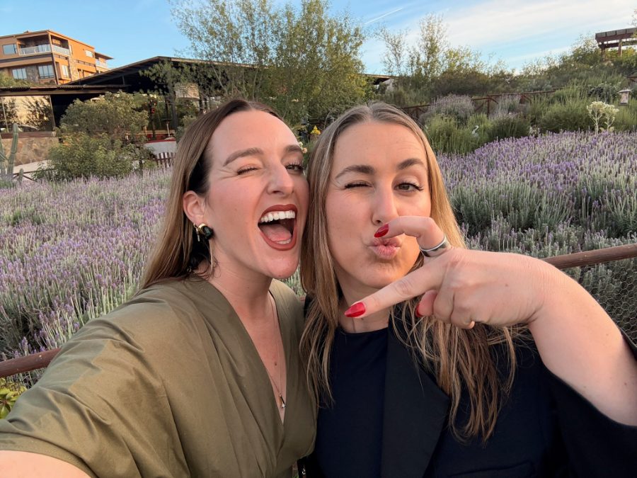 Two friends laughing in a lavender field