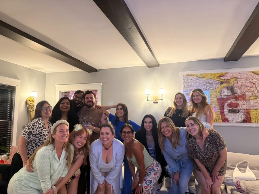 A living room full of friends at a pajama party